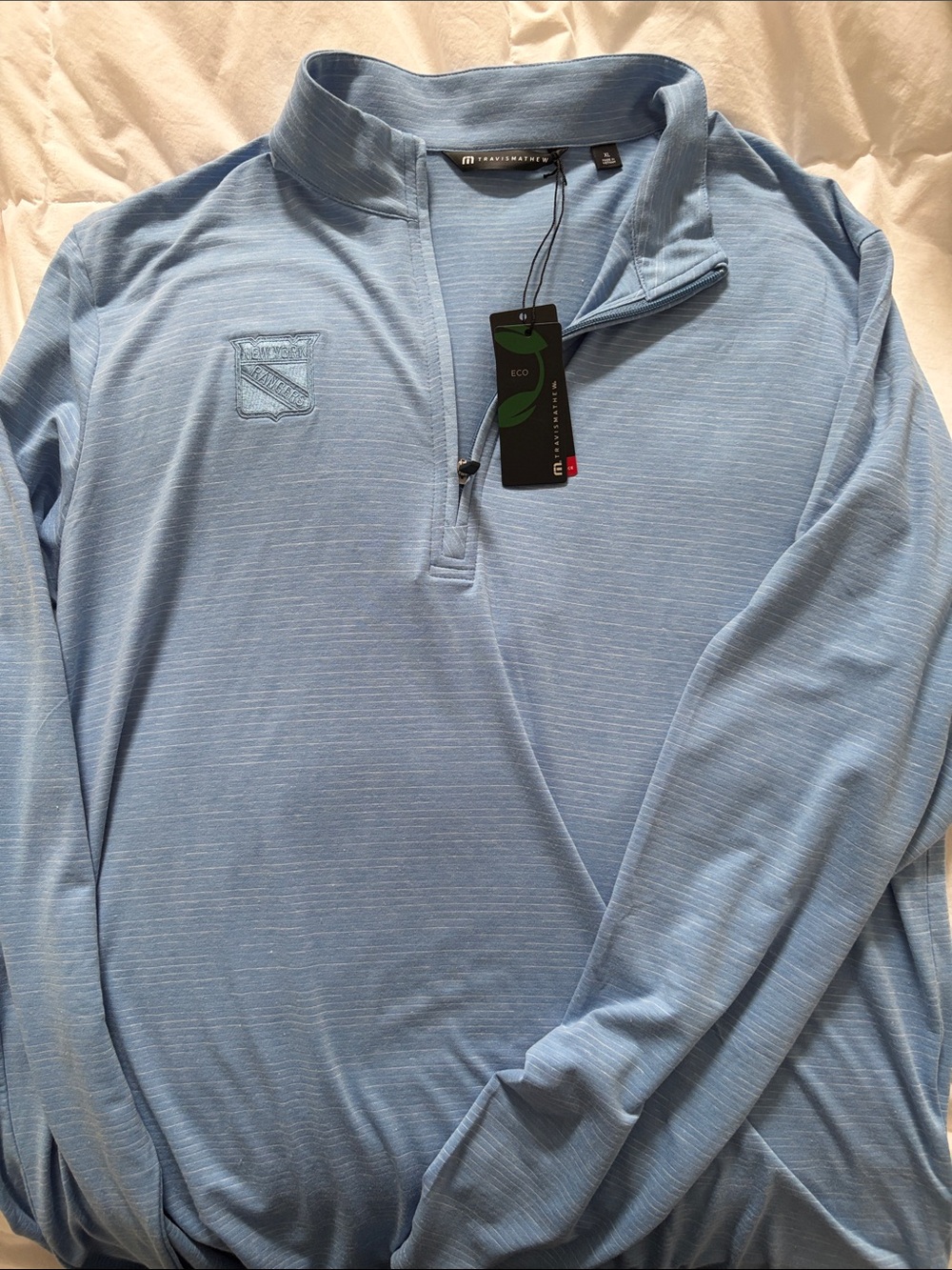 Travis Mathew Blue Heather New York Rangers Embroidered Polo